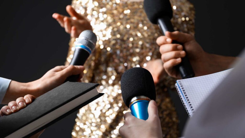 Interview scene showing microphones held toward a speaker, alongside information about famous people with autism