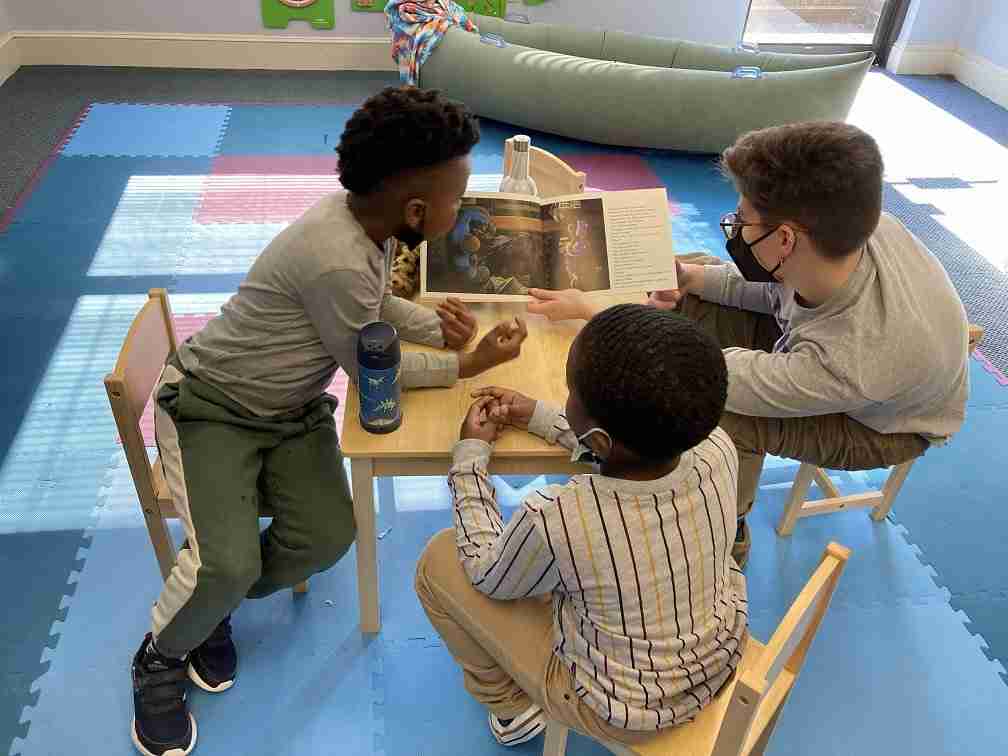 Kids reading a book