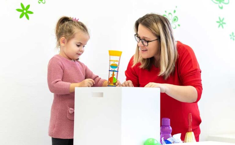 Two people in a autism therapy