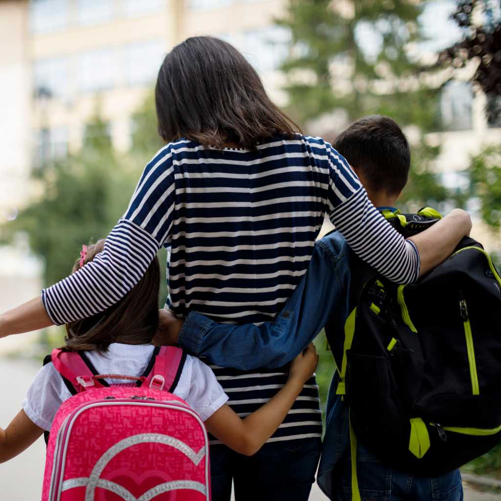 Parent supporting children during school transition
