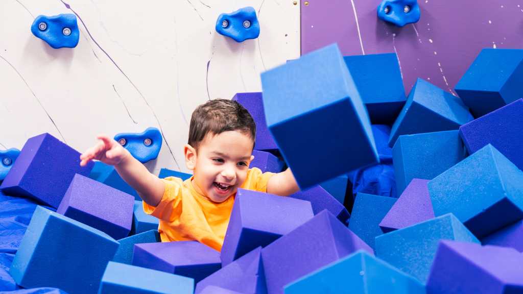 Child playing in a safe sensory-friendly ABA therapy space